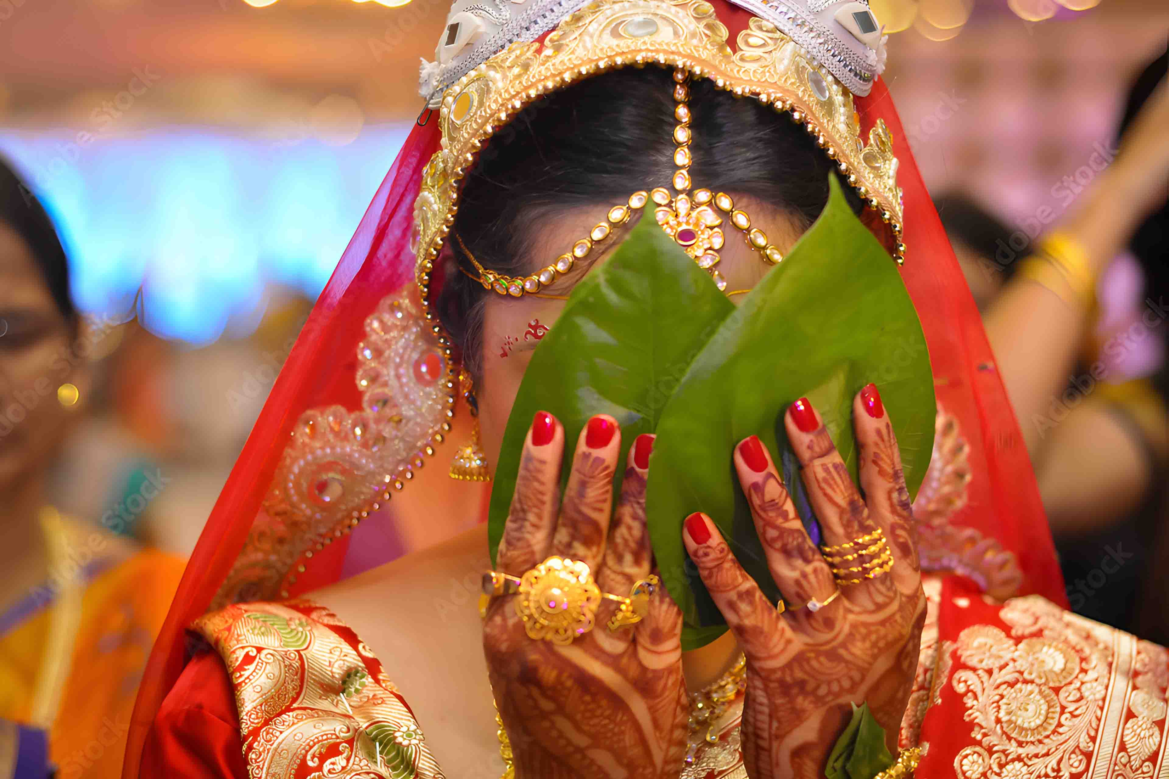 Bengali Wedding moment bride piri betel leaves