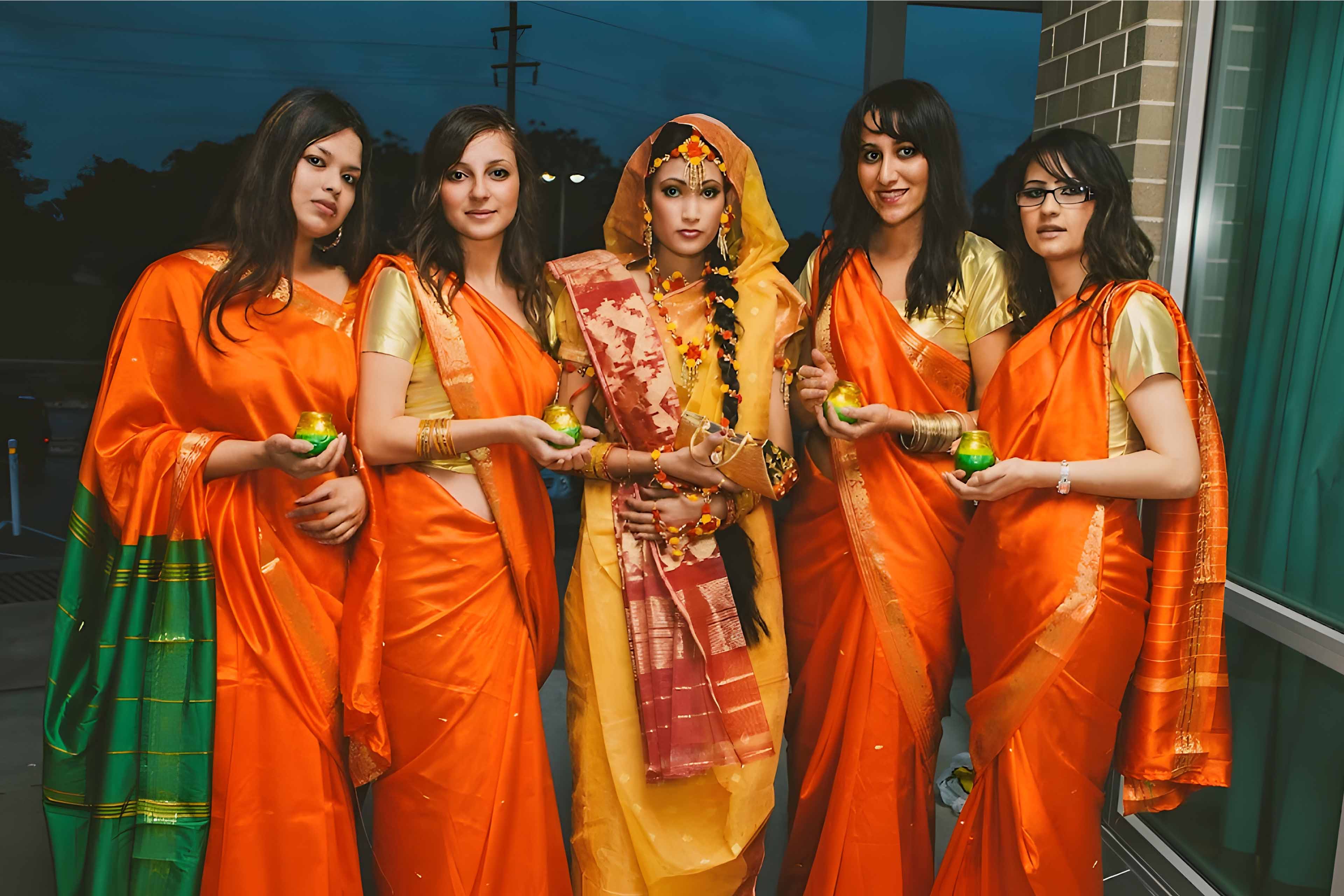 guests at a bengali wedding event - gaye holud bangla wedding ceremony